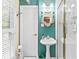 A bathroom features a pedestal sink, ornate mirror, and a glass enclosed shower at 621 Windgrove Se Dr, Marietta, GA 30067