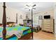 The bedroom includes a full bed with a wagon-themed bunk and hardwood floors at 621 Windgrove Se Dr, Marietta, GA 30067