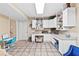 Spacious bonus room with built-in cabinets and tile flooring, ready for customization at 621 Windgrove Se Dr, Marietta, GA 30067