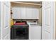 Laundry room featuring a front-load washing machine and a front-load dryer at 621 Windgrove Se Dr, Marietta, GA 30067
