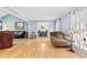 Bright living room with hardwood floors, large windows, and elegant decor at 621 Windgrove Se Dr, Marietta, GA 30067