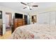 The main bedroom showcases a TV, closet, and ensuite bathroom at 621 Windgrove Se Dr, Marietta, GA 30067