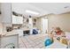 Bright playroom with built-in cabinets, and plenty of open space for activities at 621 Windgrove Se Dr, Marietta, GA 30067