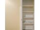 Interior closet featuring shelving, a marble top, and flooring at 1102 Wynnes Ridge Se Cir, Marietta, GA 30067