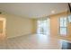 Bright living room with wood floors, sliding glass doors, and a window provide lots of natural light at 1102 Wynnes Ridge Se Cir, Marietta, GA 30067