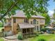 A beautiful backyard with a covered porch and ample space for outdoor entertaining at 3595 Millwater Xing, Dacula, GA 30019