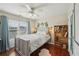 Bedroom with a window and wood accent furniture at 3595 Millwater Xing, Dacula, GA 30019