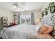 Bright bedroom with a window and modern decor at 3595 Millwater Xing, Dacula, GA 30019