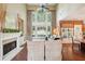 Bright living room with vaulted ceilings and a fireplace at 3595 Millwater Xing, Dacula, GA 30019