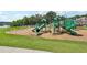Community playground with slides and climbing equipment, offers children a fun recreational space at 3595 Millwater Xing, Dacula, GA 30019