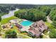 A community pool with play area and clubhouse make this neighborhood a fun place to live at 3595 Millwater Xing, Dacula, GA 30019