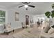 Comfortable living room with hardwood floors that flows into dining area and kitchen providing a bright space at 4670 Brookwood Dr, Cumming, GA 30041