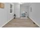 Bright room with wood-look floors, window and decorated desk at 4670 Brookwood Dr, Cumming, GA 30041