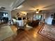 A living room showcasing a fireplace, hardwood floors, ceiling fans, and comfortable seating at 747 Dogwood Cir, Norcross, GA 30071