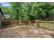 Spacious wooden deck offers a relaxing outdoor living space with a lush backyard at 2238 Pinecliff Ne Dr, Atlanta, GA 30345