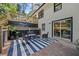 Charming back patio with stylish seating area, perfect for outdoor relaxation and entertaining at 2238 Pinecliff Ne Dr, Atlanta, GA 30345