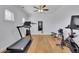 Dedicated exercise room equipped with a treadmill, bike, and weights for a convenient workout space at 4520 Odum Lake Trl, Cumming, GA 30040