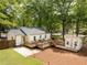 Backyard features spacious deck, landscaping, and outbuilding at 2086 Harold Se Ave, Smyrna, GA 30080