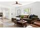 Open-concept living room with modern furnishings and lots of natural light at 2086 Harold Se Ave, Smyrna, GA 30080
