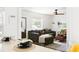 Cozy living room with comfortable seating and a view into the kitchen, creating an inviting, open space for entertaining at 2086 Harold Se Ave, Smyrna, GA 30080