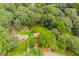View of property surrounded by mature trees at 3156 Laurel Way, Snellville, GA 30078