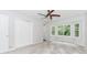 Bedroom with natural light and bay windows, featuring large closet and neutral carpeting at 3156 Laurel Way, Snellville, GA 30078
