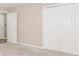 Bright bedroom with large closet featuring white doors and neutral carpeting at 3156 Laurel Way, Snellville, GA 30078