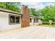 Close-up of the deck, showcasing its construction, size, and the chimney at 3156 Laurel Way, Snellville, GA 30078