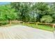 Spacious outdoor deck overlooking the expansive backyard, providing an ideal setting for outdoor gatherings at 3156 Laurel Way, Snellville, GA 30078