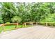 Well-built deck with a view of the lush backyard, offering a great space for relaxation and recreation at 3156 Laurel Way, Snellville, GA 30078