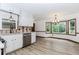 Bright dining area with a bay window and modern lighting at 3156 Laurel Way, Snellville, GA 30078