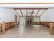Spacious living area showcases hardwood floors, a brick fireplace, wood paneling, and multiple entryways at 3156 Laurel Way, Snellville, GA 30078