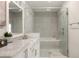 Stylish bathroom with a glass shower and tub, complemented by marble countertops at 345 Glen Iris Ne Dr # 5, Atlanta, GA 30312