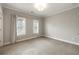 Bright, airy bedroom with large windows and neutral decor at 345 Glen Iris Ne Dr # 5, Atlanta, GA 30312