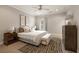 Comfortable bedroom with a large bed, ceiling fan, and decorative rug at 345 Glen Iris Ne Dr # 5, Atlanta, GA 30312