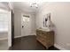 Bright entry featuring a modern console table, stylish art and sliding barn door at 345 Glen Iris Ne Dr # 5, Atlanta, GA 30312
