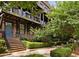 Beautiful brick townhome with an inviting entrance and professionally landscaped front yard at 345 Glen Iris Ne Dr # 5, Atlanta, GA 30312