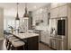 Modern kitchen with stainless steel appliances, a large island, and ample cabinet space at 345 Glen Iris Ne Dr # 5, Atlanta, GA 30312
