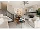 Bright living room with modern fireplace, open layout, and staircase access to upper levels at 345 Glen Iris Ne Dr # 5, Atlanta, GA 30312