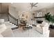 Bright living room with modern fireplace, open layout, and staircase access to upper levels at 345 Glen Iris Ne Dr # 5, Atlanta, GA 30312