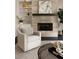 Cozy sitting area with a fireplace, built-in shelving, and stylish decor at 345 Glen Iris Ne Dr # 5, Atlanta, GA 30312