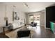 Modern living room with sleek furniture and access to a balcony at 345 Glen Iris Ne Dr # 5, Atlanta, GA 30312