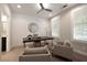 Bright home office with ceiling fan, modern furniture, and abundant natural light at 345 Glen Iris Ne Dr # 5, Atlanta, GA 30312