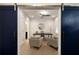 Home office with modern furniture and stylish barn doors at 345 Glen Iris Ne Dr # 5, Atlanta, GA 30312