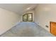 Spacious attic featuring unique windows and neutral walls and floors at 4920 Tremont Ne Dr, Marietta, GA 30066