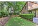 View of lush green backyard and house at 4920 Tremont Ne Dr, Marietta, GA 30066