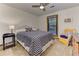 Bedroom featuring a ceiling fan, bed and furniture at 4920 Tremont Ne Dr, Marietta, GA 30066