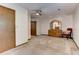A neutral bedroom featuring a ceiling fan, dresser, and a decorative chair at 4920 Tremont Ne Dr, Marietta, GA 30066