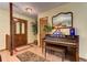 Inviting foyer featuring hardwood floors, a decorative piano, and a stained-glass front door at 4920 Tremont Ne Dr, Marietta, GA 30066
