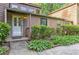 Inviting front entrance with manicured landscaping and a decorative white front door at 4920 Tremont Ne Dr, Marietta, GA 30066